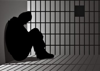 Silhouette illustration of a man in jail